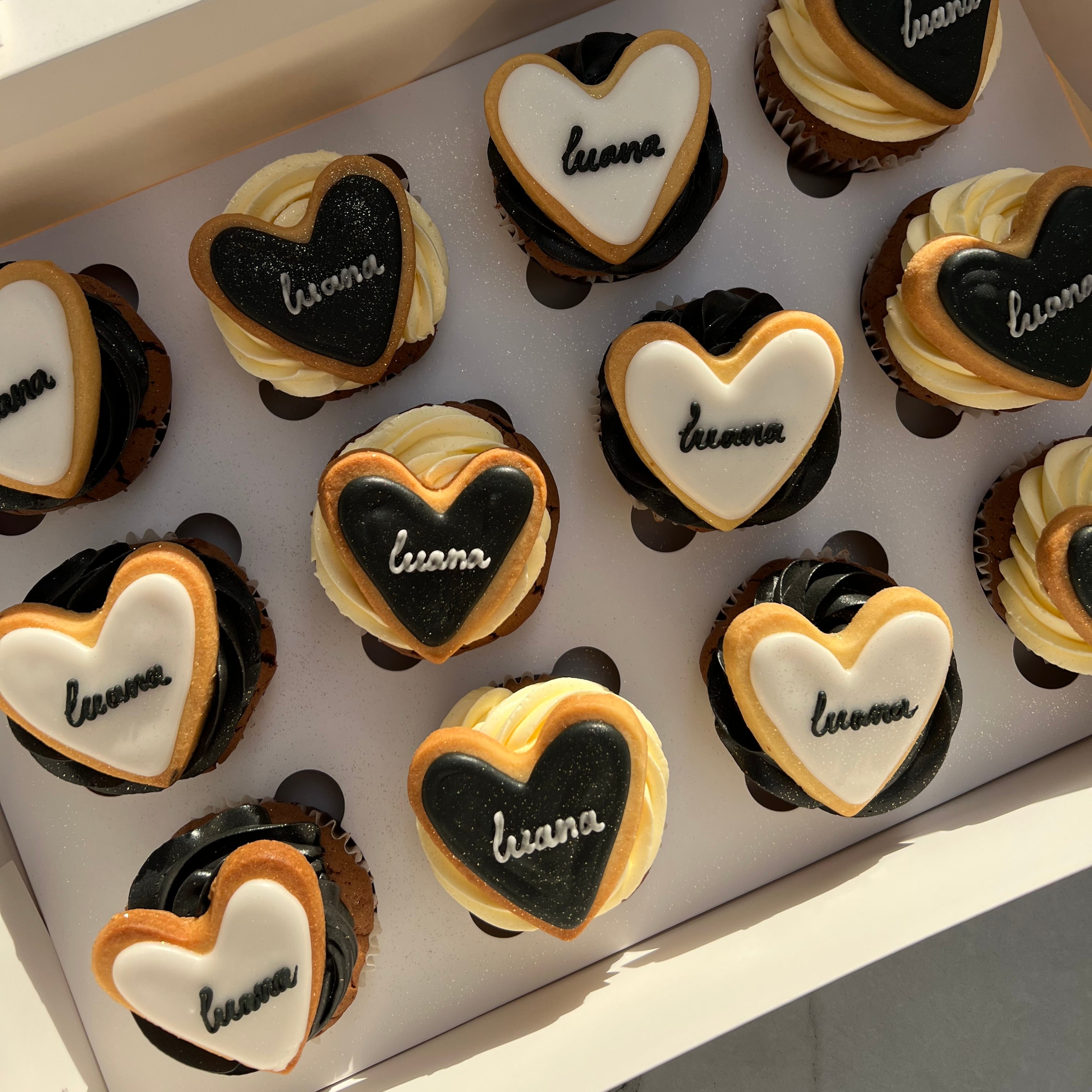 Custom heart cookie cupcakes with black and white buttercream — colors can be personalised to match your theme