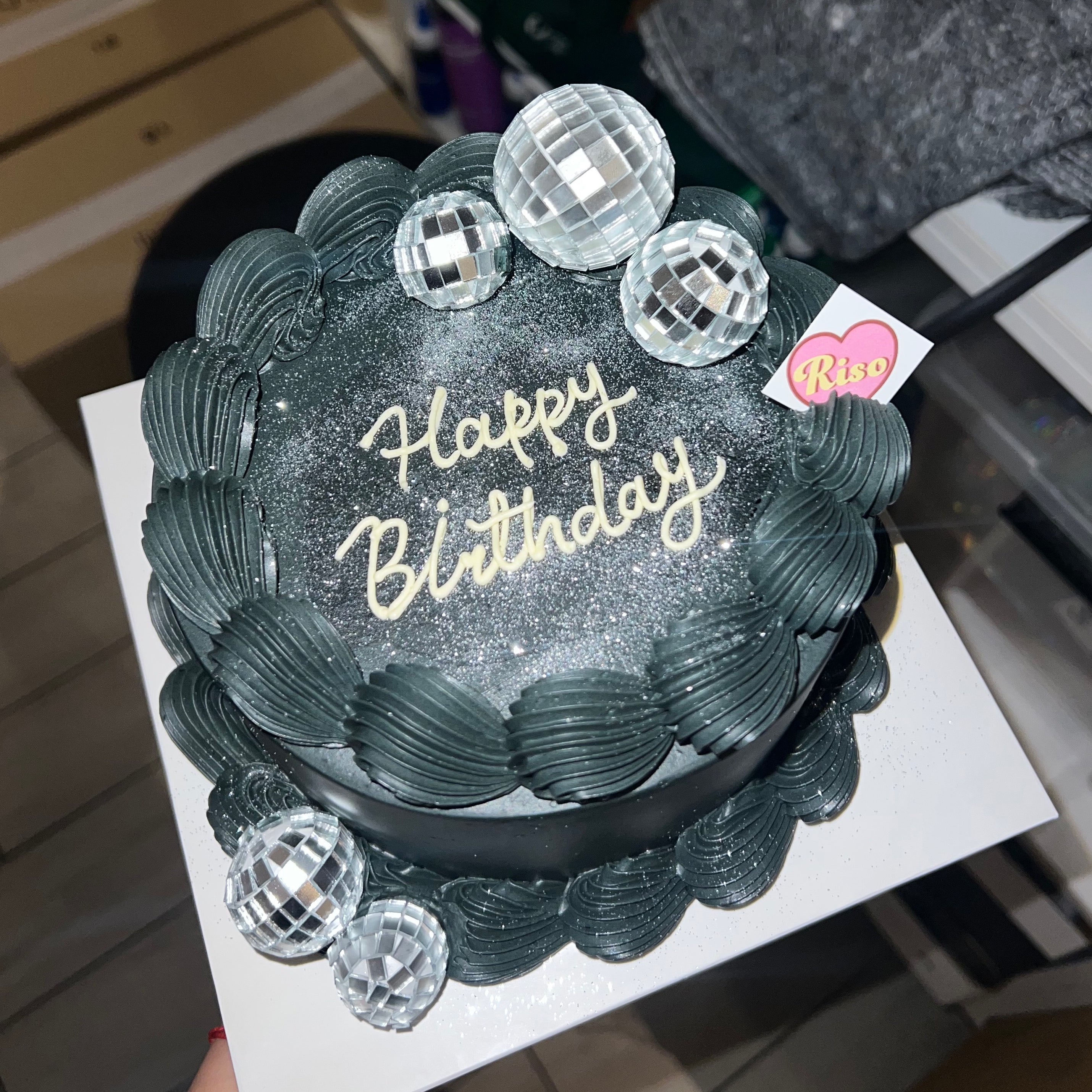 Glamorous disco-themed cake with sparkling silver dust and party-ready mirror balls 🪩✨