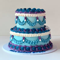 Vintage Face 2 tier Cake